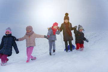 Group of children in the snow.