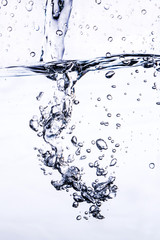 Light abstract natural water background - bubble air of  close for design beverages