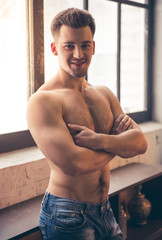 Obraz premium Sexy guy in the kitchen
