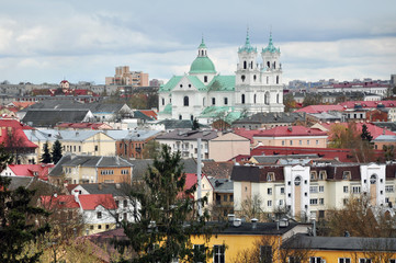 Panoramic view of Grodno, Belarus. The historic city center with red tile roofs and the old...