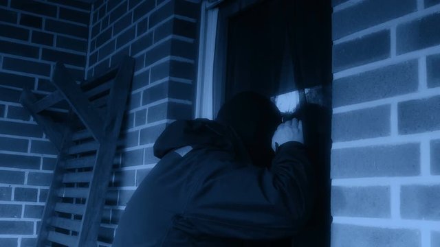 Burglar opens the door with a crowbar at night 4k 11855 

