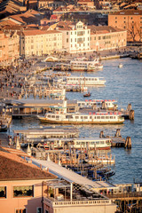 Panoramic aerial cityscape of Venice,with rooftops, the sea at sunset, Veneto, Italy.