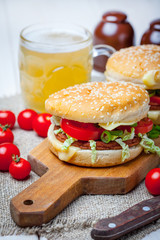 Homemade hamburger with fresh vegetables.