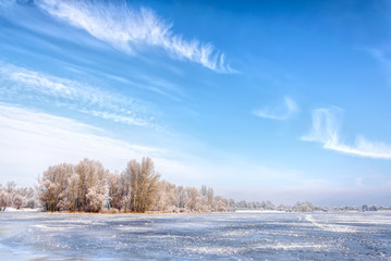 Landscape with frozen water, ice and snow on the Dnieper river in Kiev, Ukraine, during winter