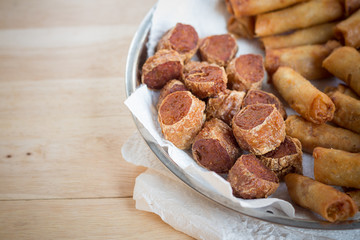 Deep fried spring rolls and deep fried chicken rolls