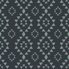 Seamless hand drawn geometric tribal pattern with rhombuses and triangles. Vector navajo design.