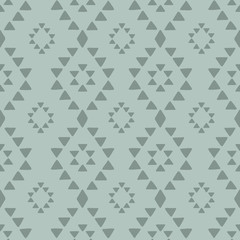 Seamless hand drawn geometric tribal pattern with rhombuses and triangles. Vector navajo design.