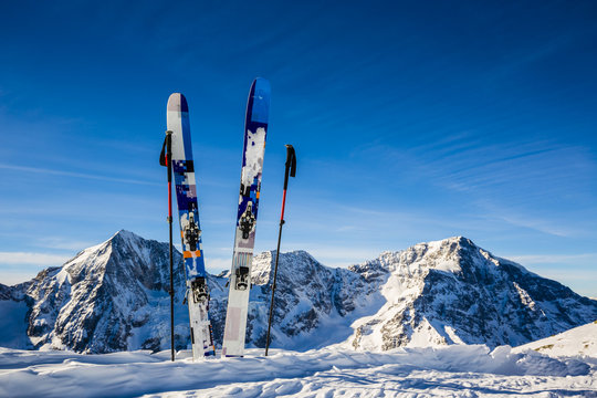 Ski in winter season, mountains and ski touring backcountry equi