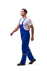 Handsome repairman wearing blue coveralls on white
