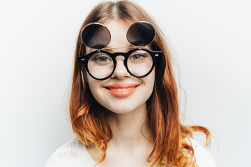 happy woman in bilateral retro glasses