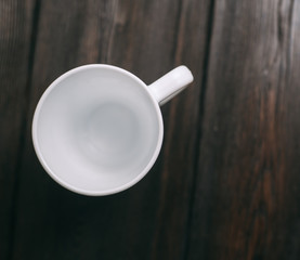 white mug on the table
