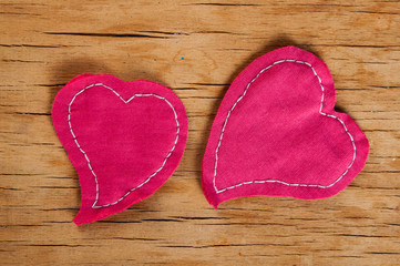 Heart made of cloth on wood desk