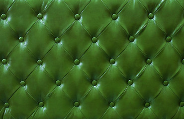 Green upholstery buttoned sofa