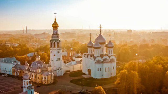 Aerial view of orthodox church in the old city Vologda in the russian north during foggy sunset.