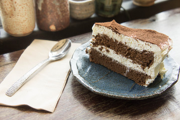 coffee cup and Chocolate cake in coffee shop