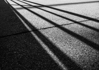 Fototapeta premium Shadow of fence on the floor