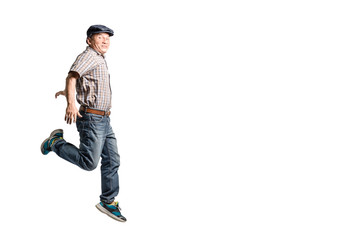 Portrait of a happy mature man running forward. Isolated full bo