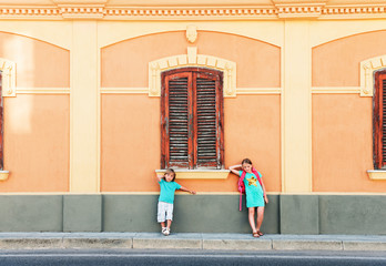 Travel with kids, two little children on summer vacation