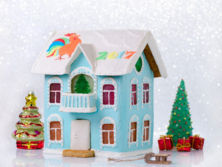 new year gingerbread two story house with balcony homemade and bokeh