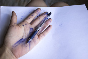 Hands stained in ink