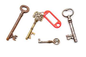 an antique key with label