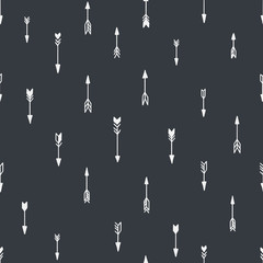 Seamless hand drawn geometric tribal pattern with arrows. Vector navajo design.