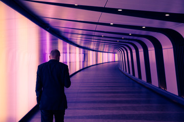 Businessman in modern tunnel