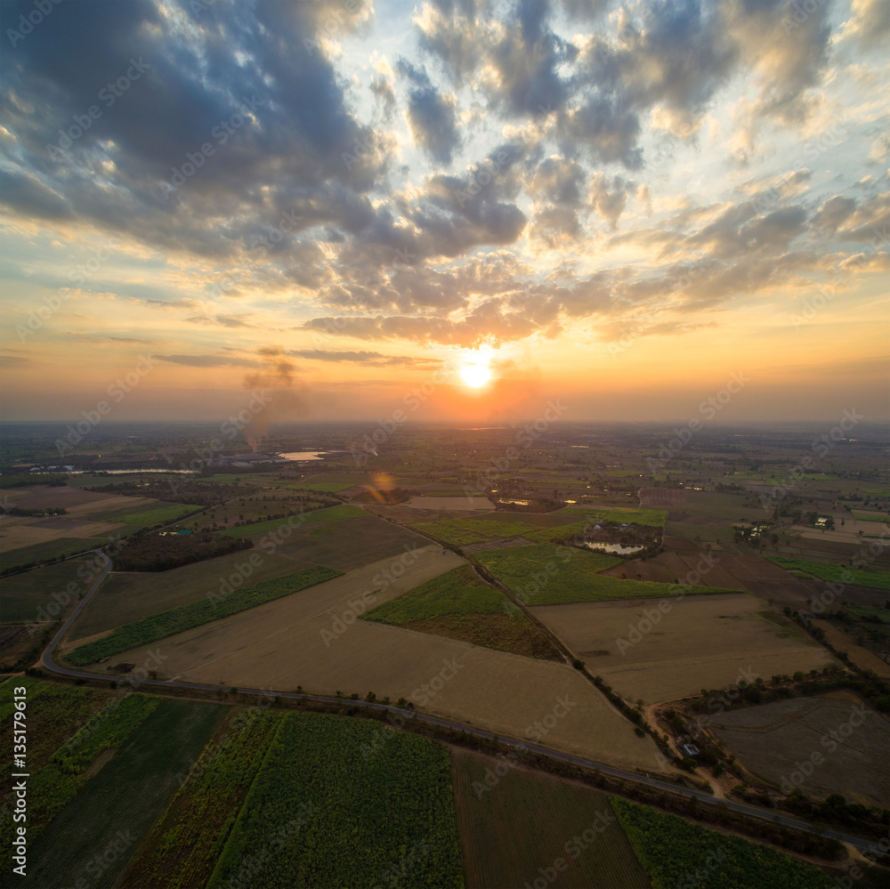 Wall mural sunset cloud and sky aerial view with skyline nature background