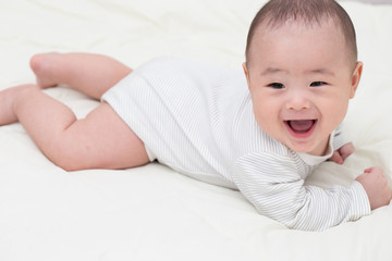 Portrait adorable baby smiling and surprise