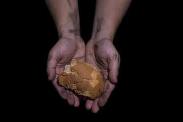 Giving bread. Poverty concept.