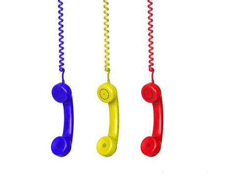 Three colorful phones hanging from a cable