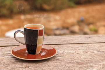 coffee cup on wooden table