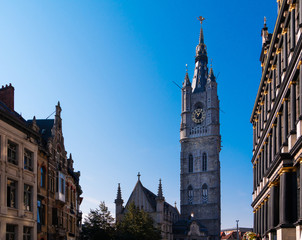 Beautiful skyline of Ghent, Belgian city. Cityscape of Gent on sunny day against blue skies. Copy space.