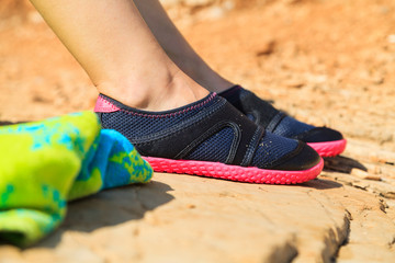 Naklejka premium Woman in water shoe