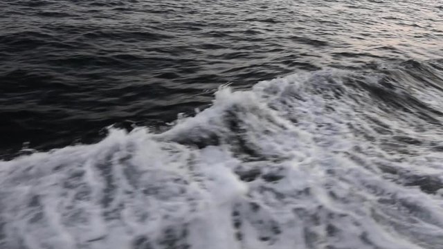A powerful wake created by a large passenger boat shows the force behind displacing large volumes of water. Shot with a Nikon D7100 24mp camera at f8, shutter speed 60..