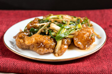 wok fried chicken stir fry with sweet peppers and chinese vegeta