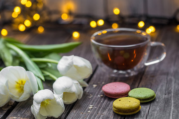 white tulips and a Cup of tea
