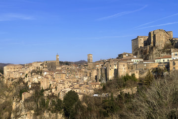 Fototapeta na wymiar Beautiful panoramic view of the tuff village of Sorano, in the Grosseto Maremma, Grosseto, Tuscany, Italy
