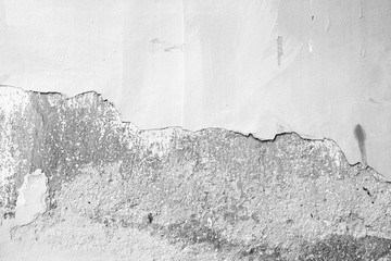 Wall fragment with scratches and cracks