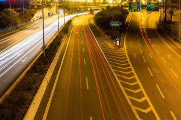 Fototapeta na wymiar Speed Traffic - light trails on motorway highway at night