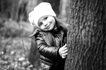 The little girl smiling in the park