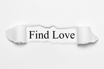 Find Love on white torn paper