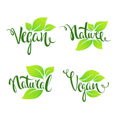 vegan and nature, green glossy leaves and lettering composition