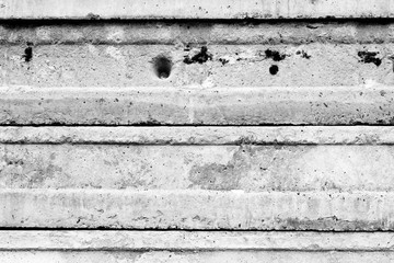 Wall fragment with scratches and cracks