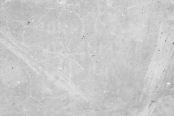 Wall fragment with scratches and cracks