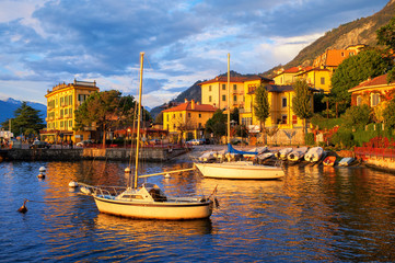 Obraz premium Yachts in a harbour on Lake Como, Italy, on sunset
