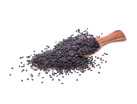 black sesame in a wooden spoon