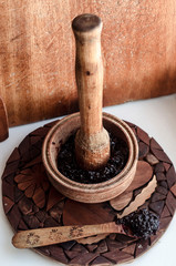Wooden mortar and a plate