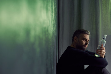 Broken man with alcohol