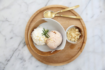 ice cream with cream on wood